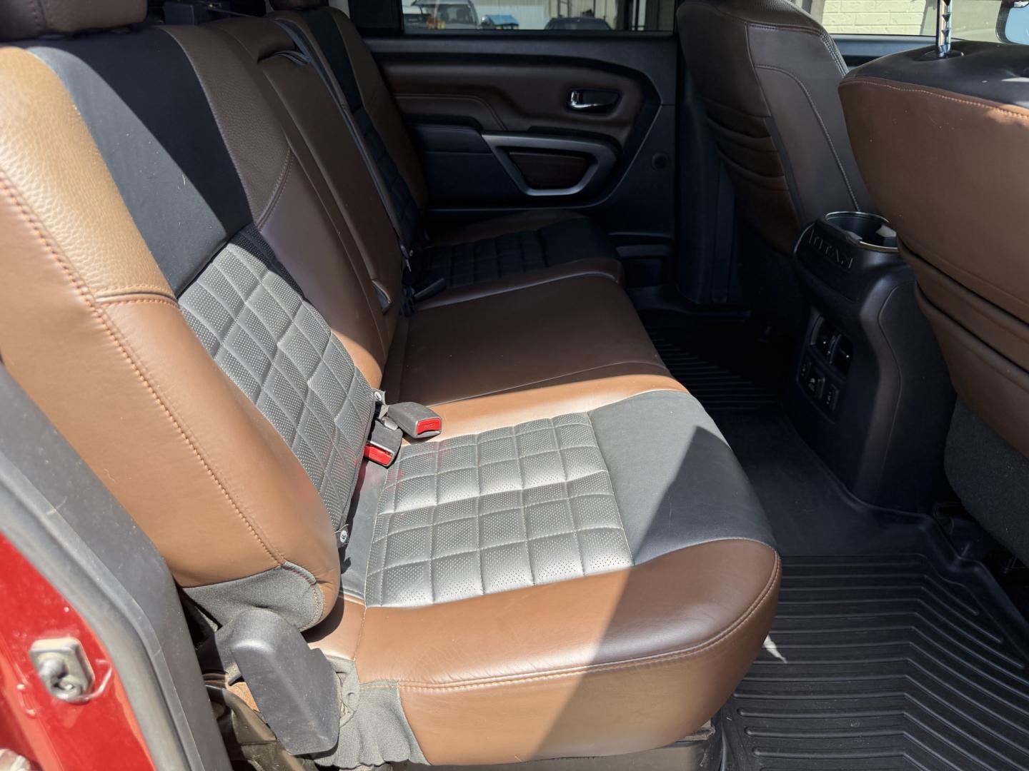 2017 RED NISSAN TITAN PLATINUM SV (1N6AA1E55HN) with an 5.6L 8CYL engine, located at 922 W. Beacon St., Philadelphia, MS, 39350, (601) 650-3675, 32.770447, -89.127151 - Photo#14