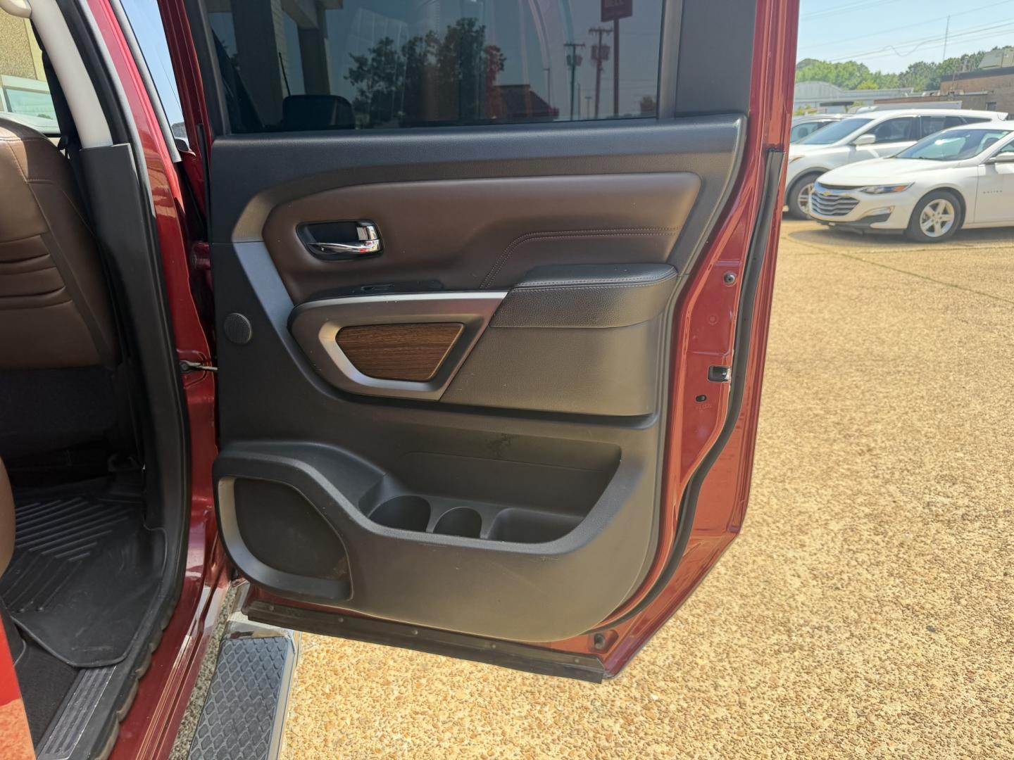 2017 RED NISSAN TITAN PLATINUM SV (1N6AA1E55HN) with an 5.6L 8CYL engine, located at 922 W. Beacon St., Philadelphia, MS, 39350, (601) 650-3675, 32.770447, -89.127151 - Photo#15