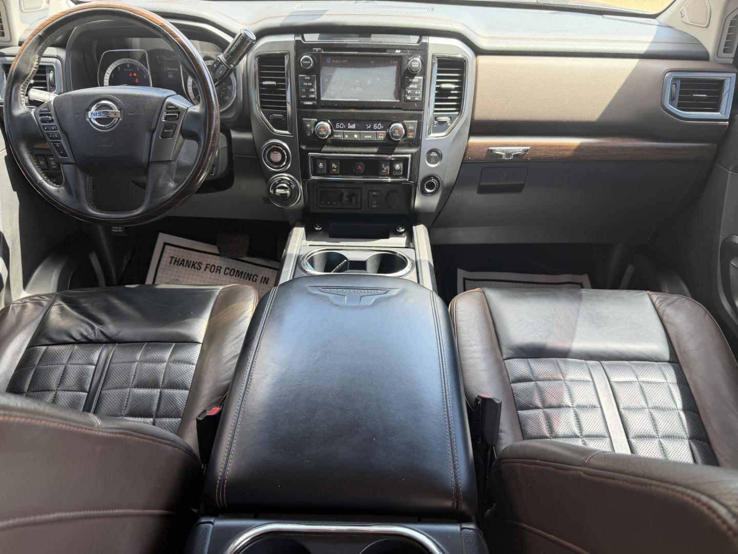 2017 RED NISSAN TITAN PLATINUM SV (1N6AA1E55HN) with an 5.6L 8CYL engine, located at 922 W. Beacon St., Philadelphia, MS, 39350, (601) 650-3675, 32.770447, -89.127151 - Photo#16