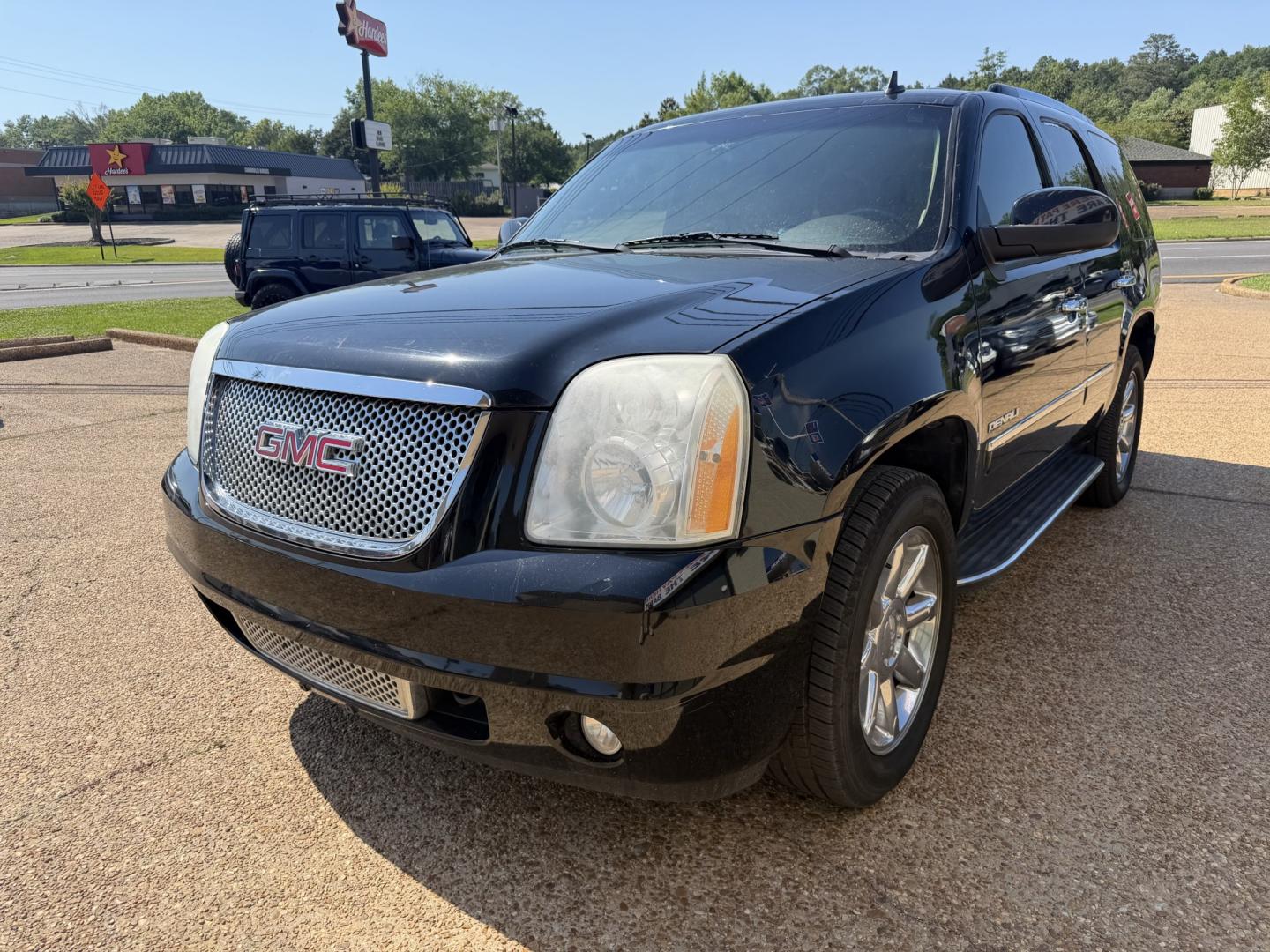 2012 BLACK GMC YUKON DENALI (1GKS1EEF8CR) , located at 922 W. Beacon St., Philadelphia, MS, 39350, (601) 650-3675, 32.770447, -89.127151 - Photo#2