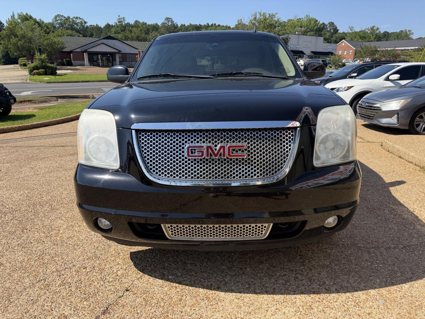 2012 BLACK GMC YUKON DENALI (1GKS1EEF8CR) , located at 922 W. Beacon St., Philadelphia, MS, 39350, (601) 650-3675, 32.770447, -89.127151 - Photo#1