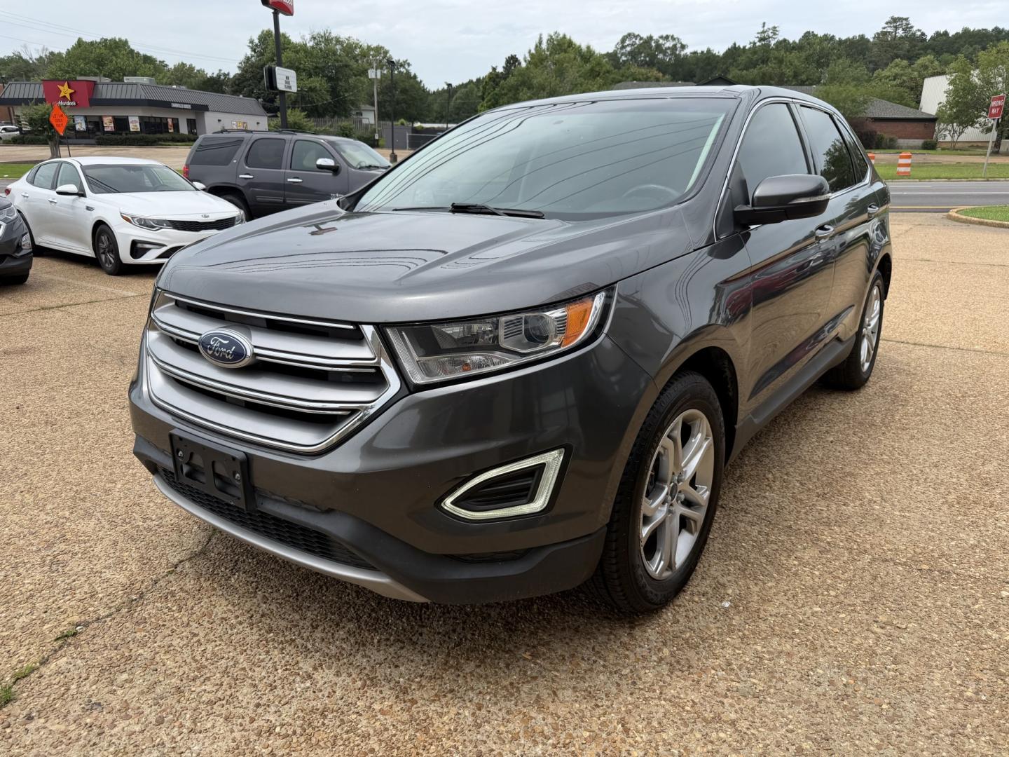 2015 GRAY FORD EDGE TITANIUM Titanium (2FMTK3K95FB) with an 2.0 L 4 Cyl engine, located at 922 W. Beacon St., Philadelphia, MS, 39350, (601) 650-3675, 32.770447, -89.127151 - Photo#2