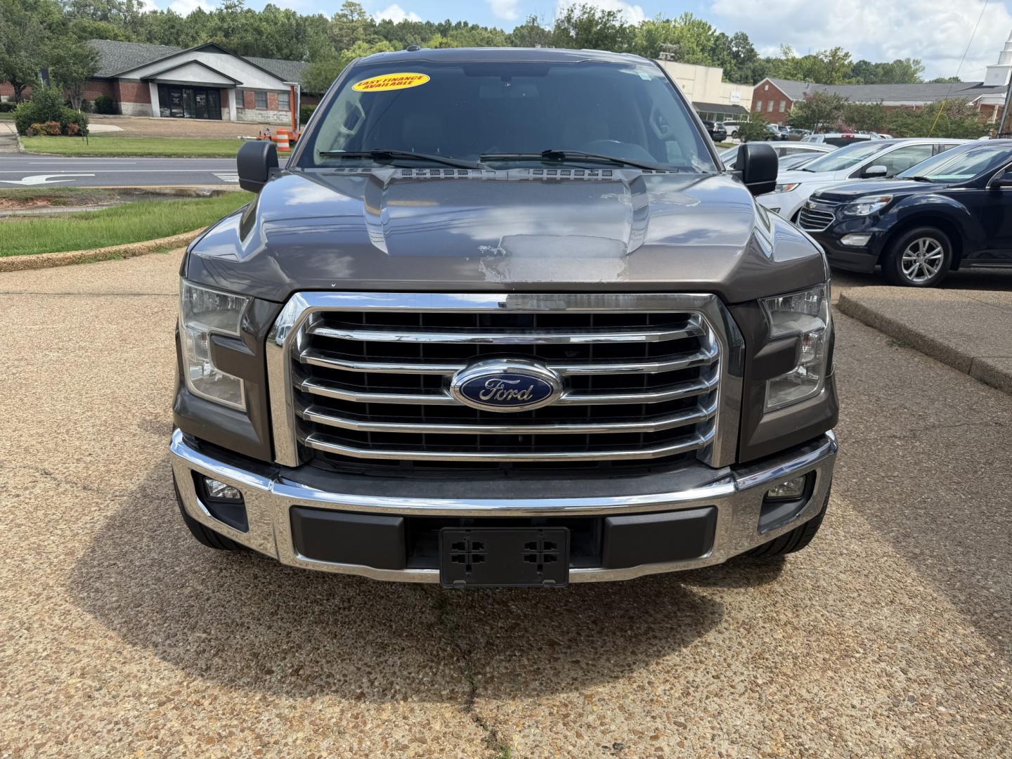 2015 BROWN FORD F-150 XLT XLT (1FTEW1CP8FK) with an 2.7L 6CYL engine, located at 922 W. Beacon St., Philadelphia, MS, 39350, (601) 650-3675, 32.770447, -89.127151- Photo#1