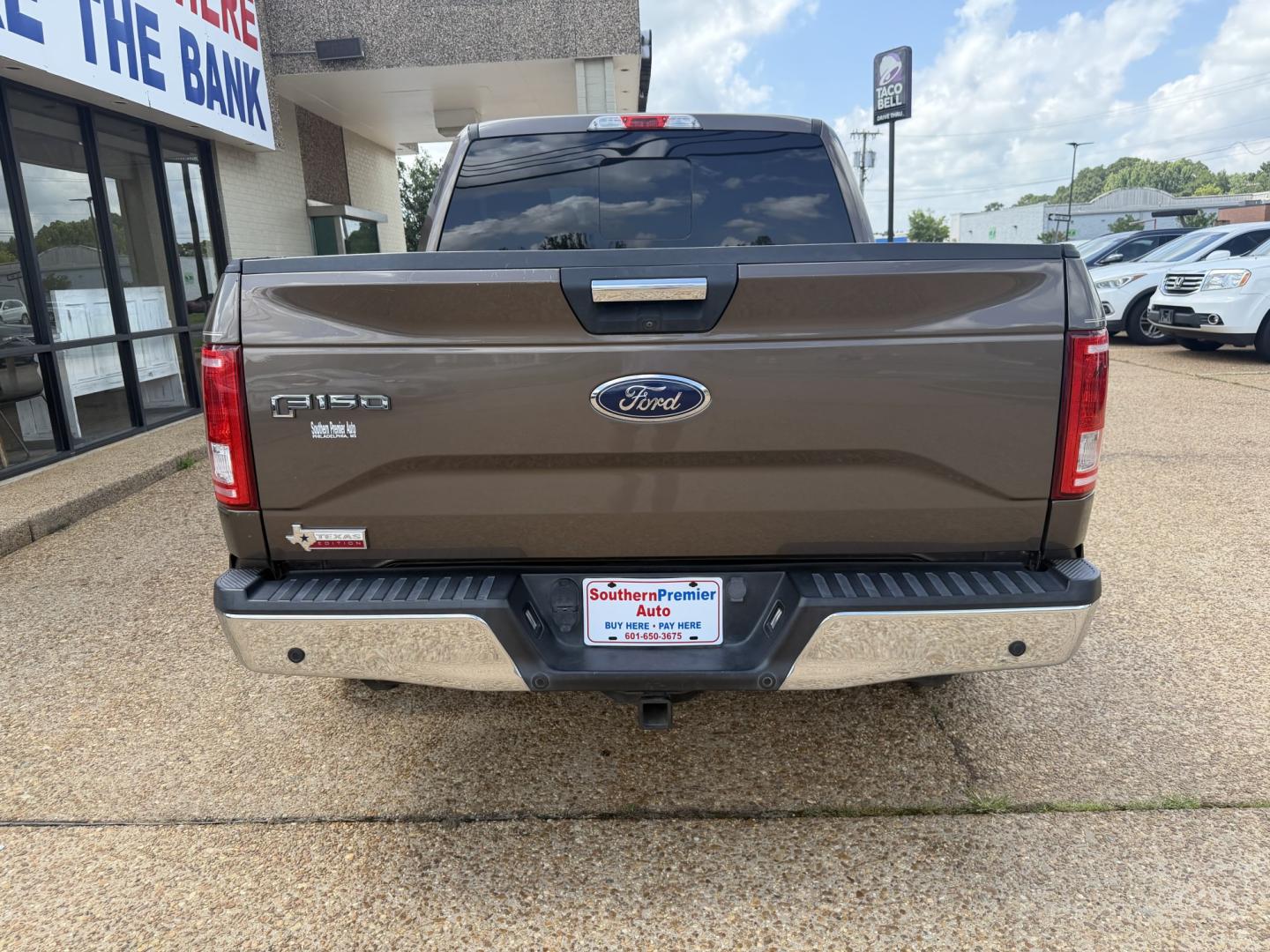 2015 BROWN FORD F-150 XLT XLT (1FTEW1CP8FK) with an 2.7L 6CYL engine, located at 922 W. Beacon St., Philadelphia, MS, 39350, (601) 650-3675, 32.770447, -89.127151- Photo#4