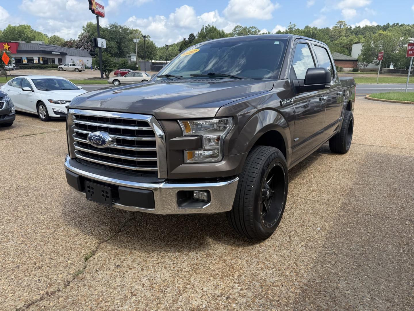 2015 BROWN FORD F-150 XLT XLT (1FTEW1CP8FK) with an 2.7L 6CYL engine, located at 922 W. Beacon St., Philadelphia, MS, 39350, (601) 650-3675, 32.770447, -89.127151- Photo#2