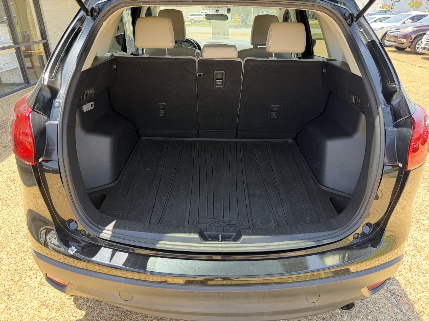 2015 BLACK MAZDA CX-5 GRAND TOURING (JM3KE2DY7F0) , located at 922 W. Beacon St., Philadelphia, MS, 39350, (601) 650-3675, 32.770447, -89.127151- Photo#19