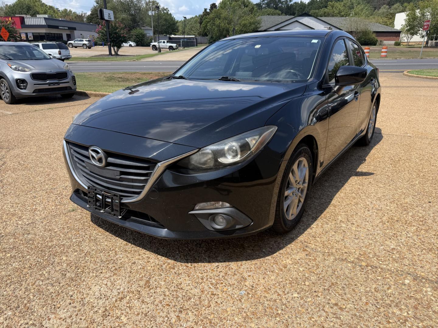 2016 BLACK MAZDA MAZDA3 I TOURING (JM1BM1V71G1) , located at 922 W. Beacon St., Philadelphia, MS, 39350, (601) 650-3675, 32.770447, -89.127151- Photo#2