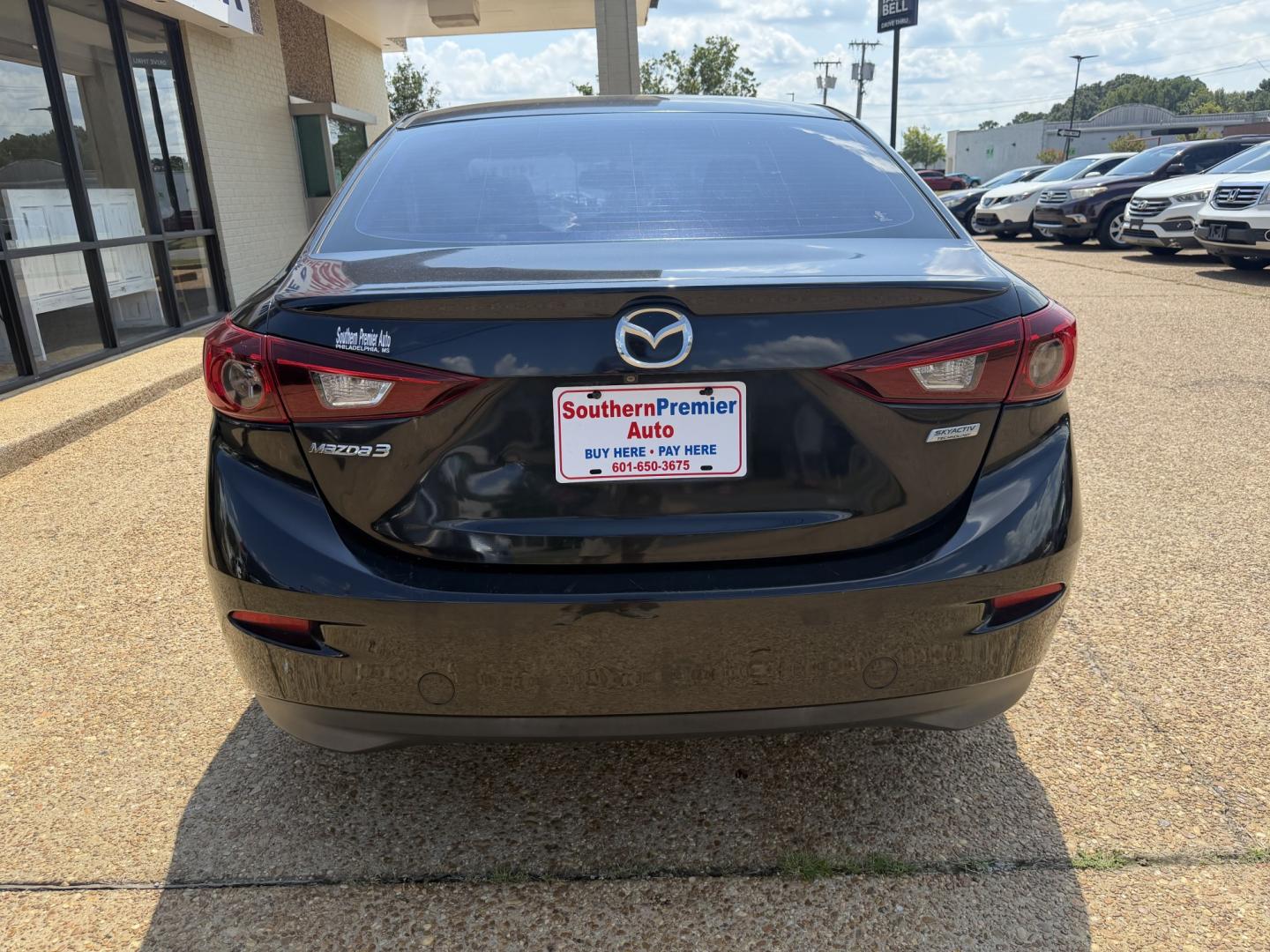 2016 BLACK MAZDA MAZDA3 I TOURING (JM1BM1V71G1) , located at 922 W. Beacon St., Philadelphia, MS, 39350, (601) 650-3675, 32.770447, -89.127151- Photo#4