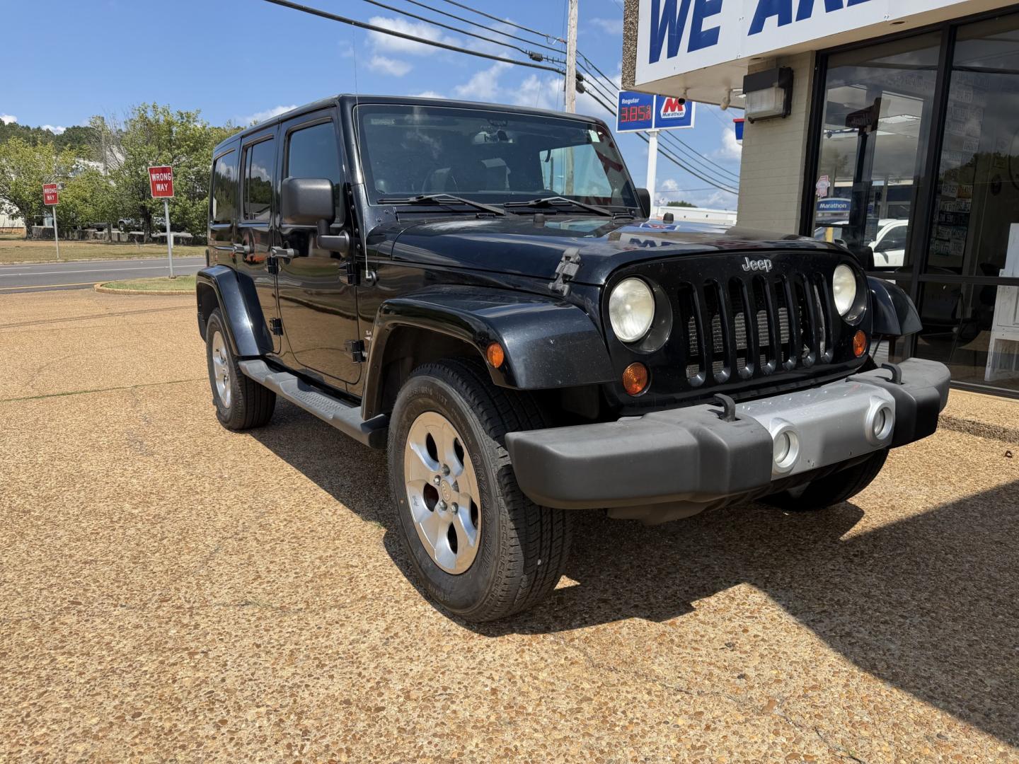2013 BLACK JEEP WRANGLER UNLIMITED S (1C4HJWEG4DL) , located at 922 W. Beacon St., Philadelphia, MS, 39350, (601) 650-3675, 32.770447, -89.127151- Photo#0