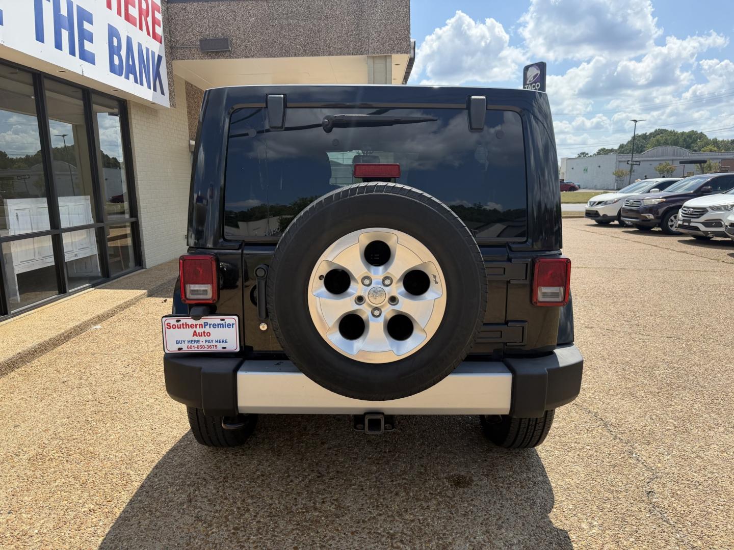 2013 BLACK JEEP WRANGLER UNLIMITED S (1C4HJWEG4DL) , located at 922 W. Beacon St., Philadelphia, MS, 39350, (601) 650-3675, 32.770447, -89.127151- Photo#4