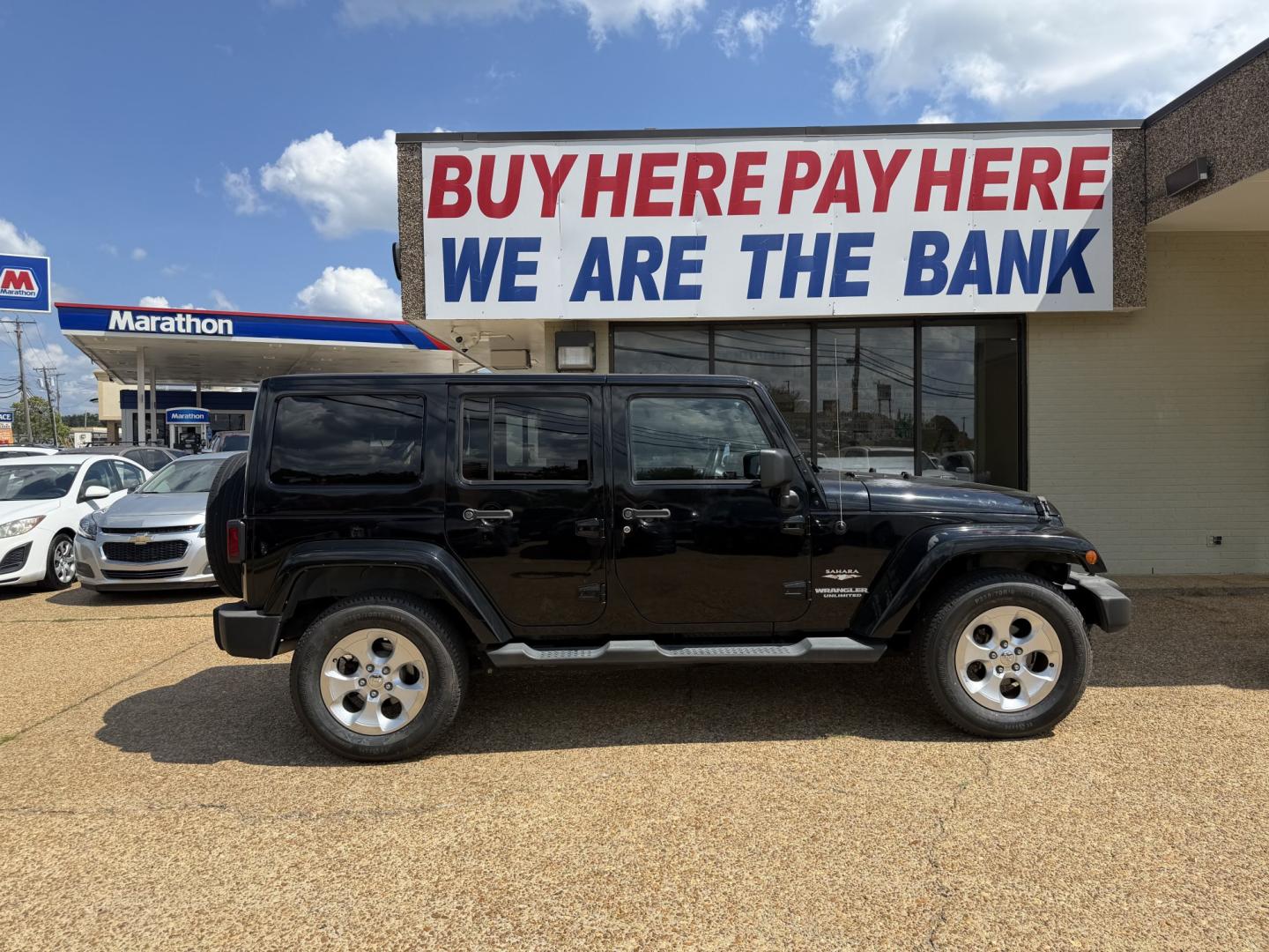 2013 BLACK JEEP WRANGLER UNLIMITED S (1C4HJWEG4DL) , located at 922 W. Beacon St., Philadelphia, MS, 39350, (601) 650-3675, 32.770447, -89.127151- Photo#6