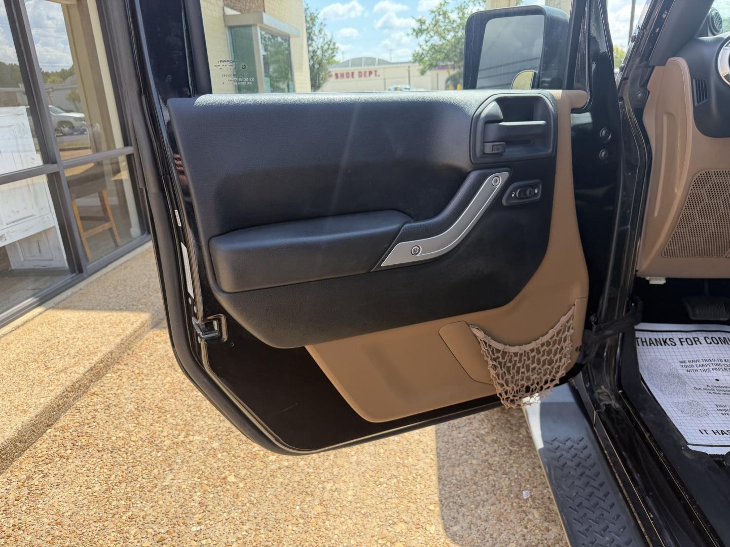 2013 BLACK JEEP WRANGLER UNLIMITED S (1C4HJWEG4DL) , located at 922 W. Beacon St., Philadelphia, MS, 39350, (601) 650-3675, 32.770447, -89.127151- Photo#8