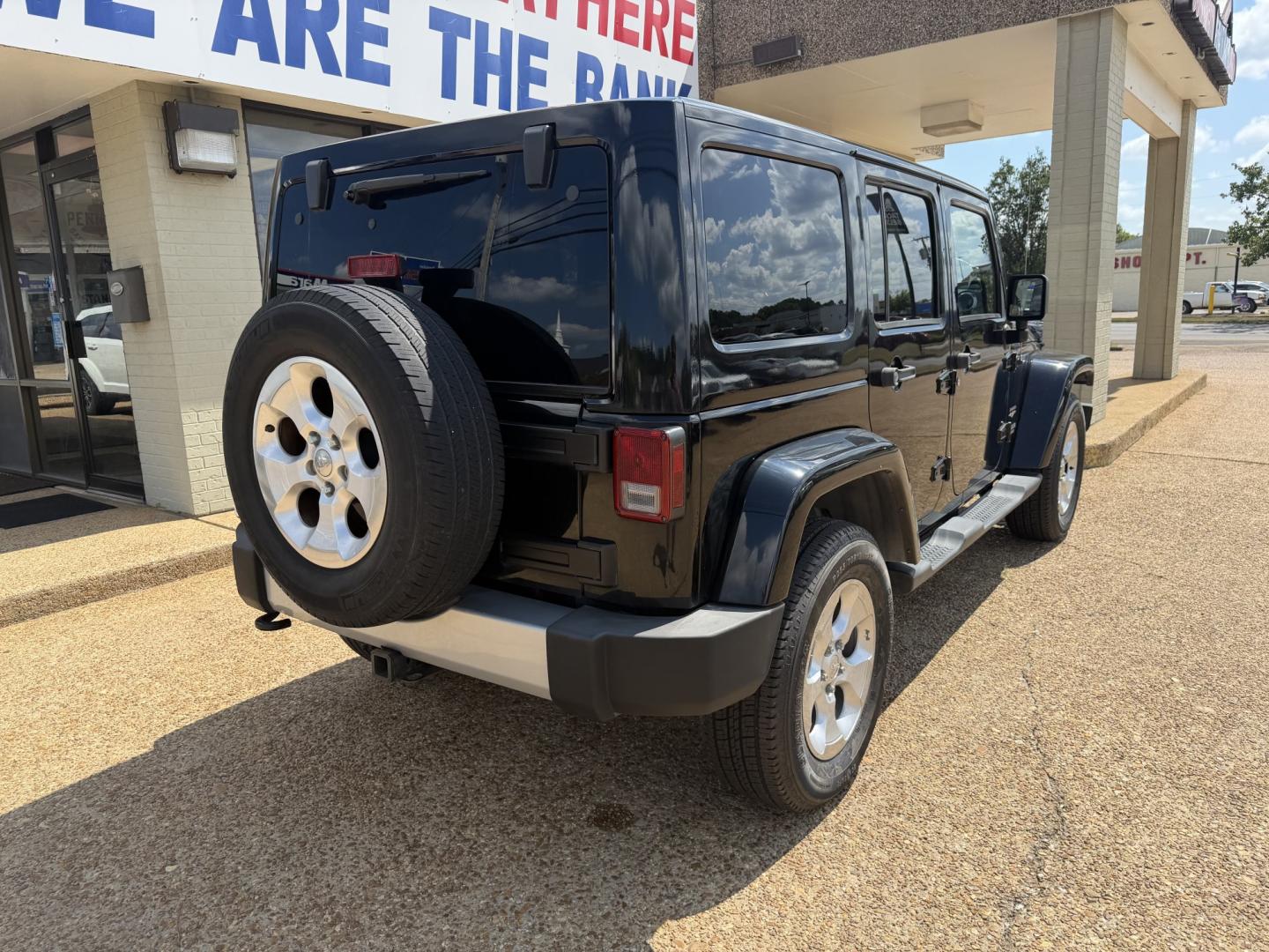 2013 BLACK JEEP WRANGLER UNLIMITED S (1C4HJWEG4DL) , located at 922 W. Beacon St., Philadelphia, MS, 39350, (601) 650-3675, 32.770447, -89.127151- Photo#5