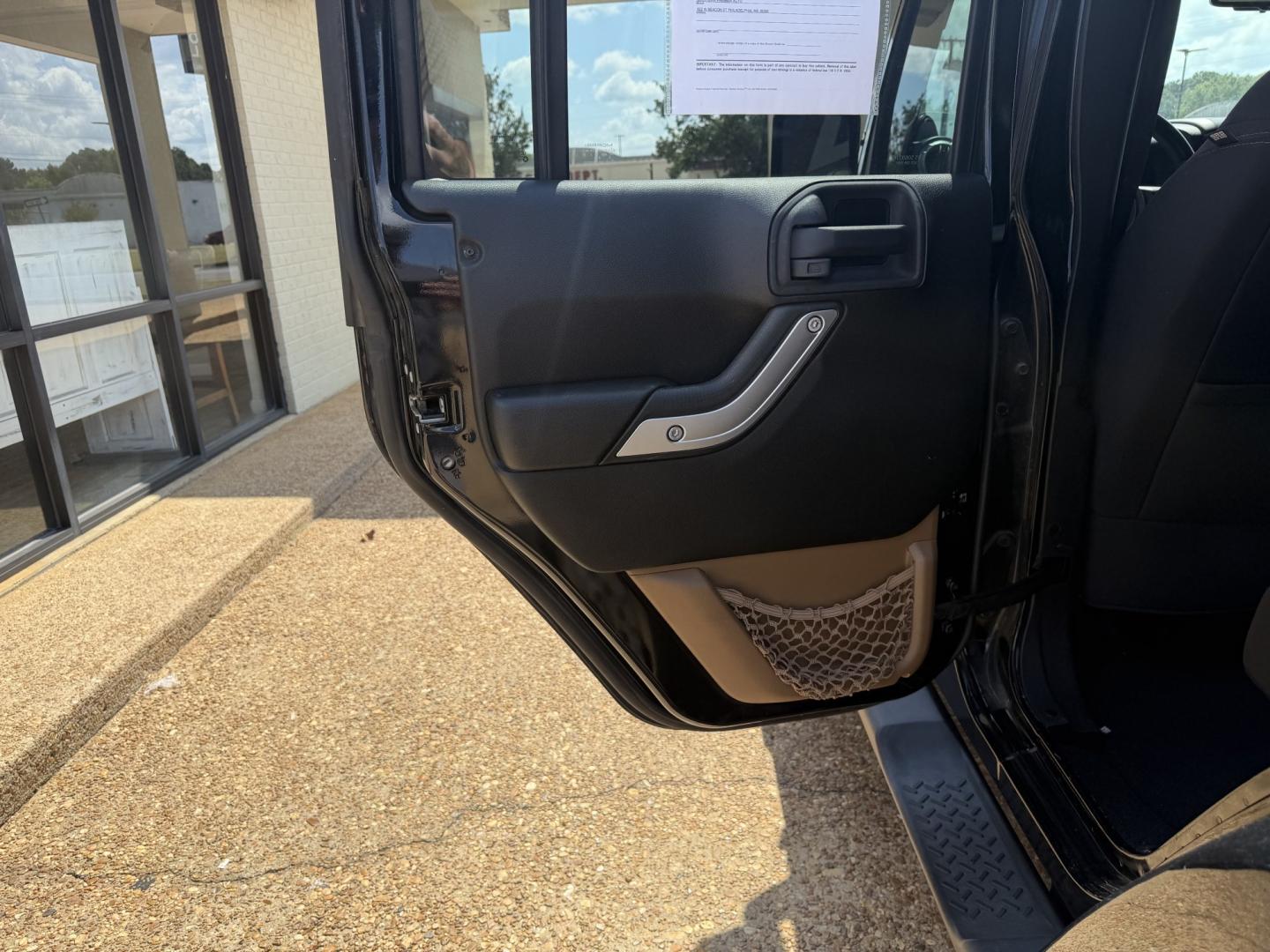 2013 BLACK JEEP WRANGLER UNLIMITED S (1C4HJWEG4DL) , located at 922 W. Beacon St., Philadelphia, MS, 39350, (601) 650-3675, 32.770447, -89.127151- Photo#12