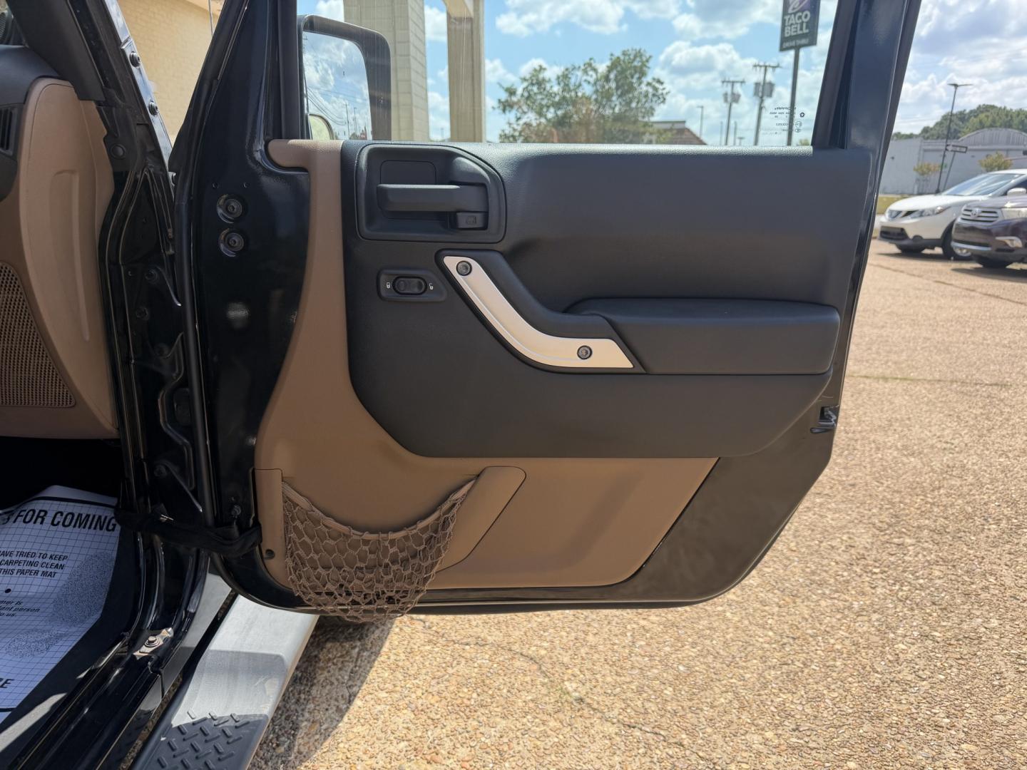 2013 BLACK JEEP WRANGLER UNLIMITED S (1C4HJWEG4DL) , located at 922 W. Beacon St., Philadelphia, MS, 39350, (601) 650-3675, 32.770447, -89.127151- Photo#11