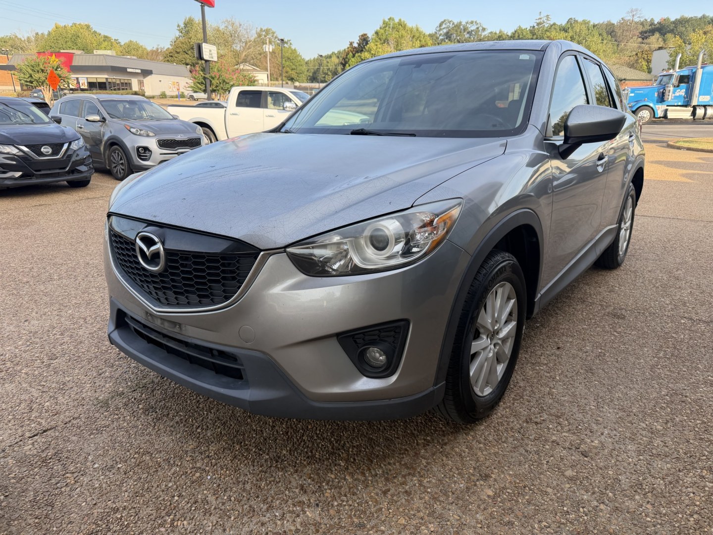 2014 SILVER MAZDA CX-5 TOURING (JM3KE2CY1E0) , located at 922 W. Beacon St., Philadelphia, MS, 39350, (601) 650-3675, 32.770447, -89.127151- Photo#2