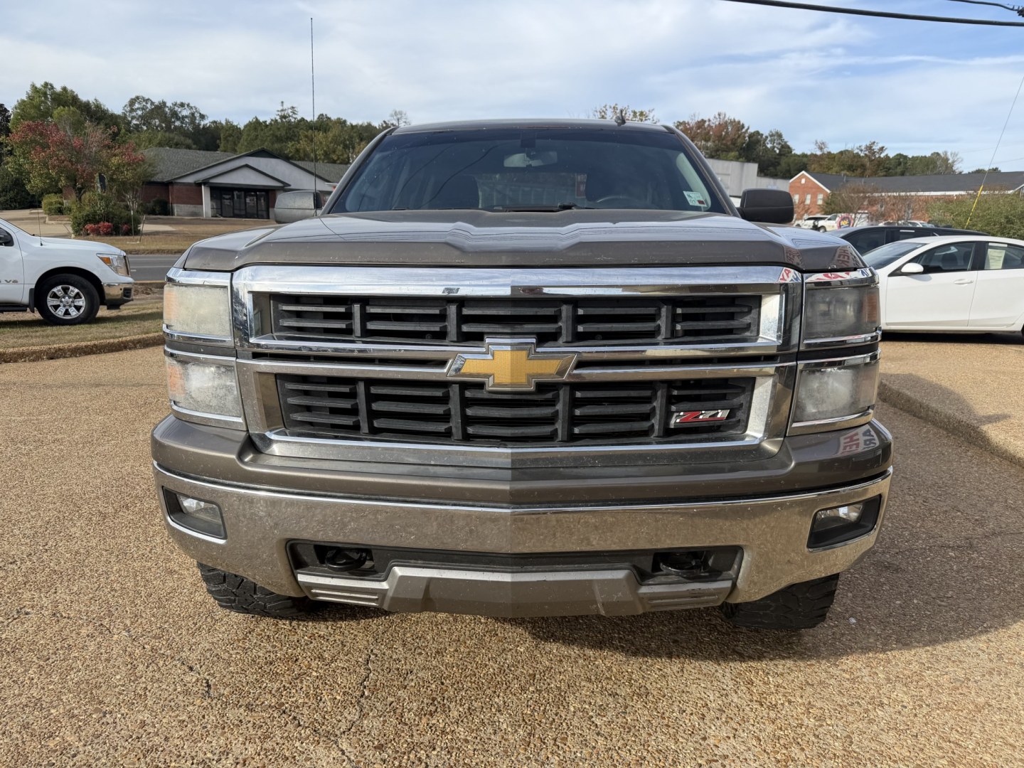 2014 BROWN CHEVROLET SILVERADO LT (3GCUKREC0EG) , located at 922 W. Beacon St., Philadelphia, MS, 39350, (601) 650-3675, 32.770447, -89.127151- Photo#1