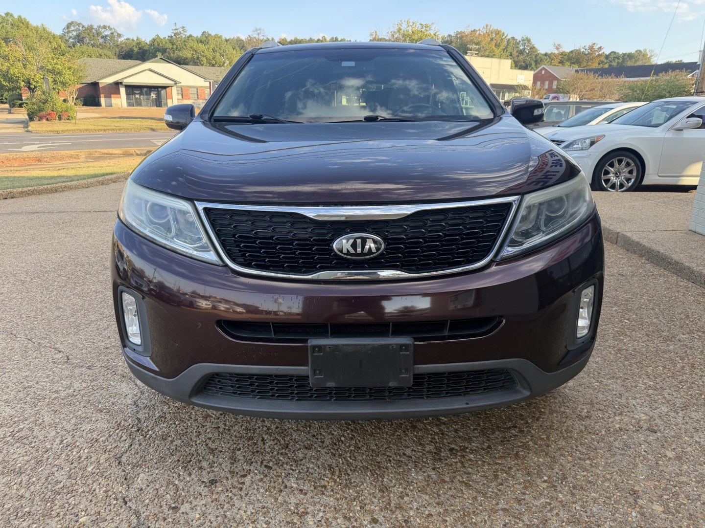 2015 BURGUNDY KIA SORENTO LX (5XYKT4A62FG) , located at 922 W. Beacon St., Philadelphia, MS, 39350, (601) 650-3675, 32.770447, -89.127151- Photo#1