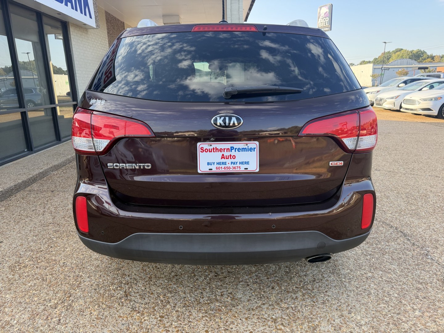 2015 BURGUNDY KIA SORENTO LX (5XYKT4A62FG) , located at 922 W. Beacon St., Philadelphia, MS, 39350, (601) 650-3675, 32.770447, -89.127151- Photo#4