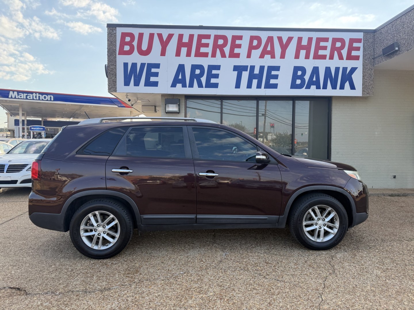 2015 BURGUNDY KIA SORENTO LX (5XYKT4A62FG) , located at 922 W. Beacon St., Philadelphia, MS, 39350, (601) 650-3675, 32.770447, -89.127151- Photo#6